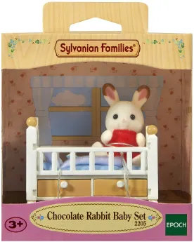 BEBE LAPIN CHOCOLAT/LIT  Ce set comprend le lit et la figurine Bébé...